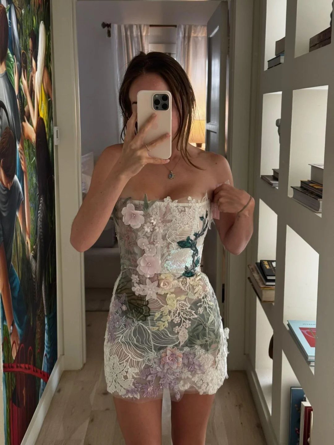 13 Going on 30 Outfits: 6 Ideas to Recreate the Iconic Style 1 Woman in a strapless white mini dress with colorful 3D floral appliques.
