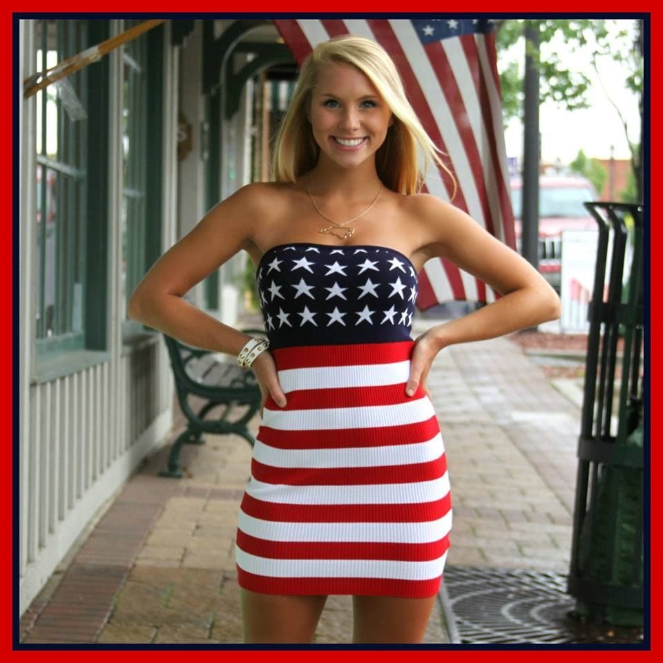 4th of July Outfits: 8 Festive Looks for Women 5 Woman wearing a strapless red, white, and blue American flag themed mini dress.
