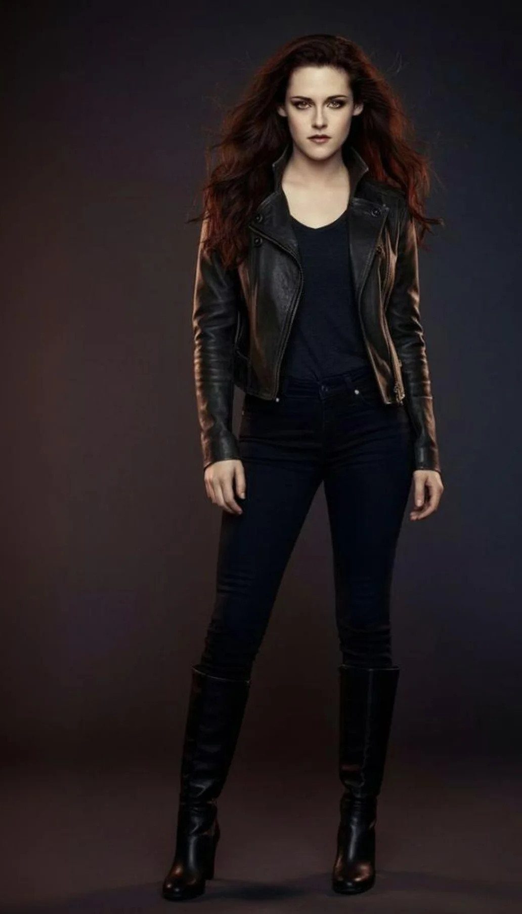 Bella Swan Outfits: 10 Iconic Looks from the Twilight Saga 5 Woman wearing all-black outfit with leather jacket, skinny jeans, and knee-high boots.