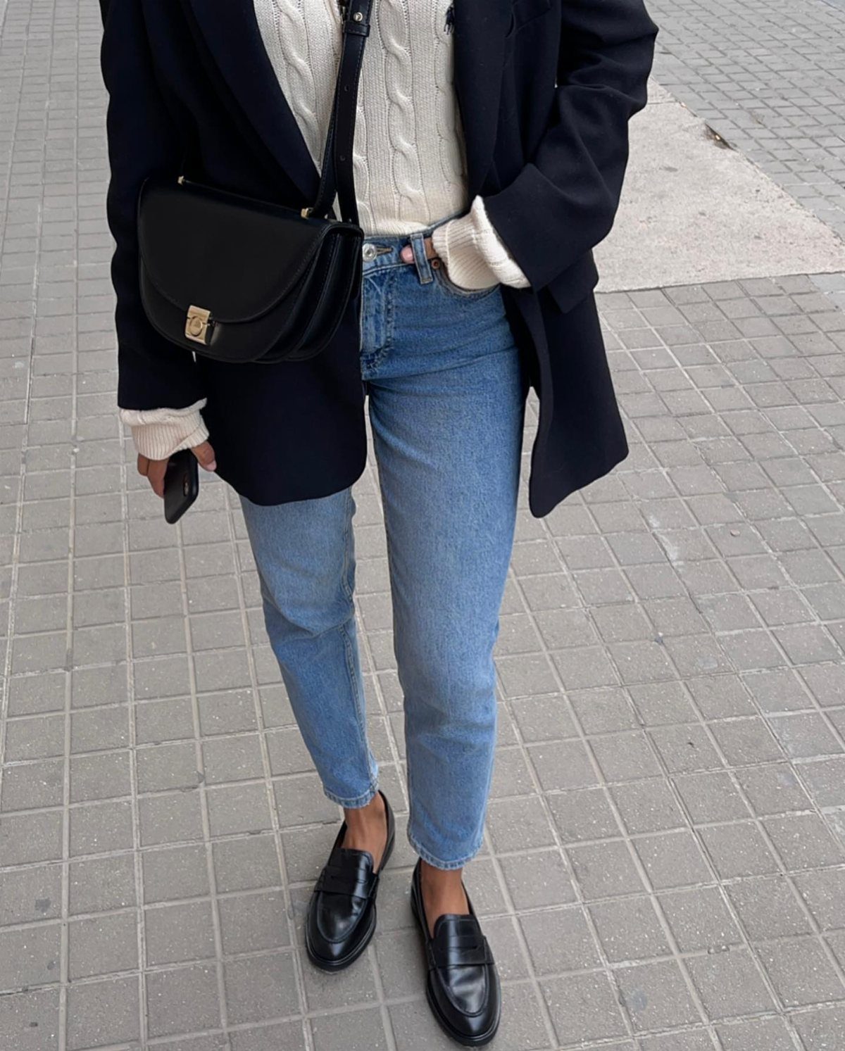 Dark Academia Outfits Female: 12 Ideas for Timeless Style 4 Black leather loafers worn with light blue jeans and a navy blazer.