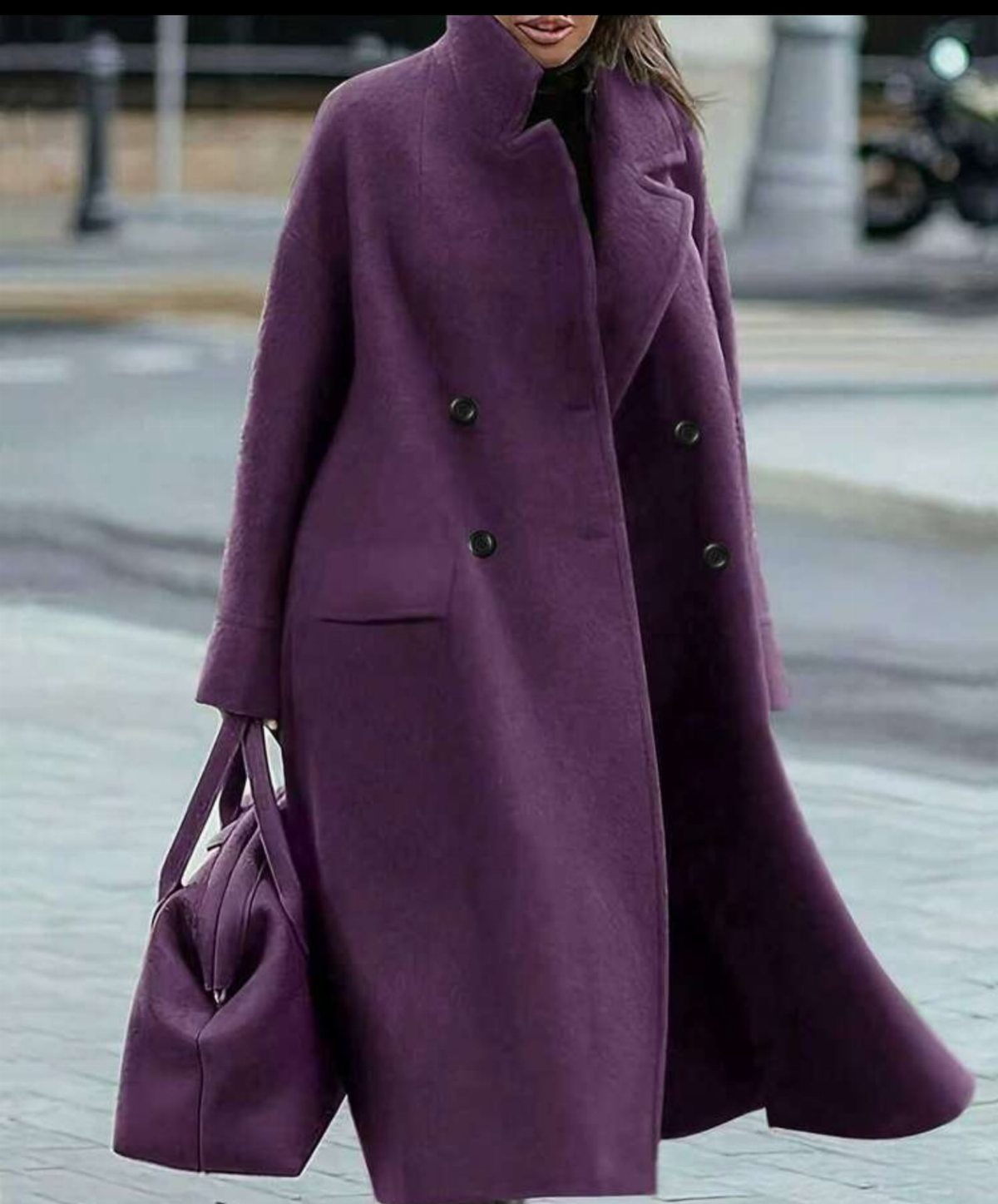 Purple Winter Outfits: 9 Ways to Style the Season's Boldest Color 1 Person wearing a long purple wool coat and carrying a matching purple handbag.