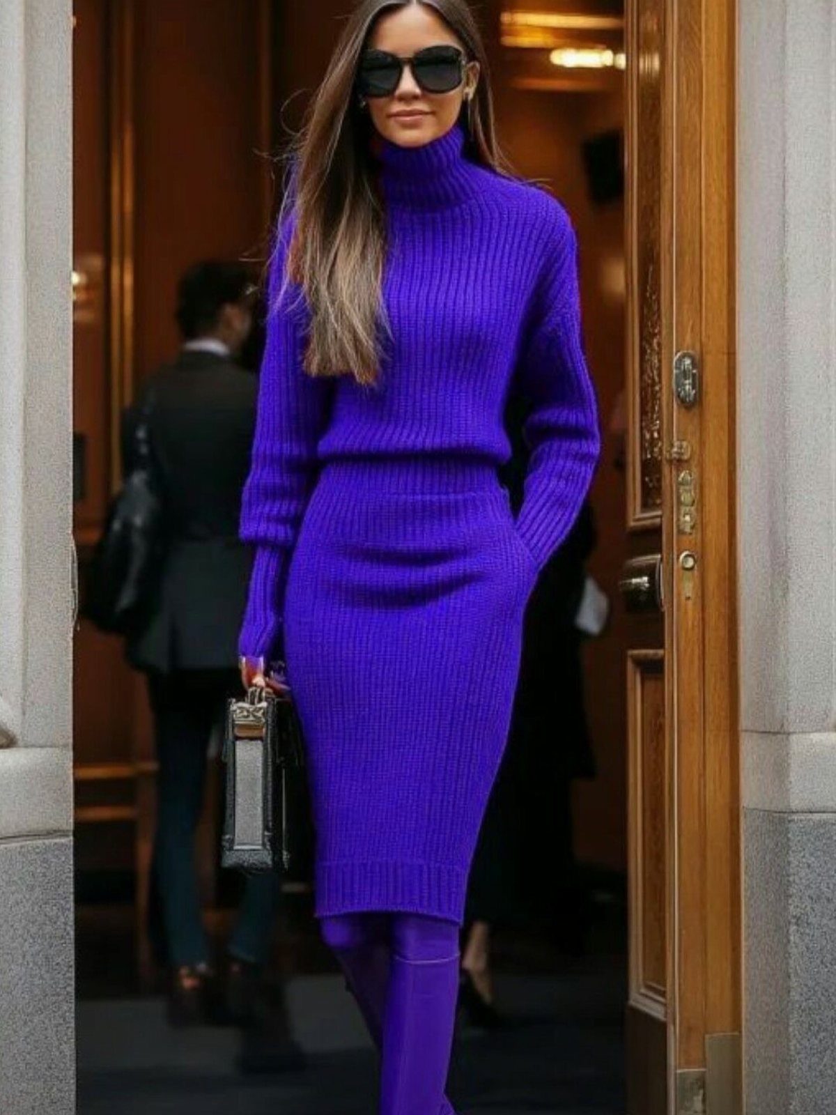 Purple Winter Outfits: 9 Ways to Style the Season's Boldest Color 7 Woman in a purple ribbed knit turtleneck dress and matching purple boots.