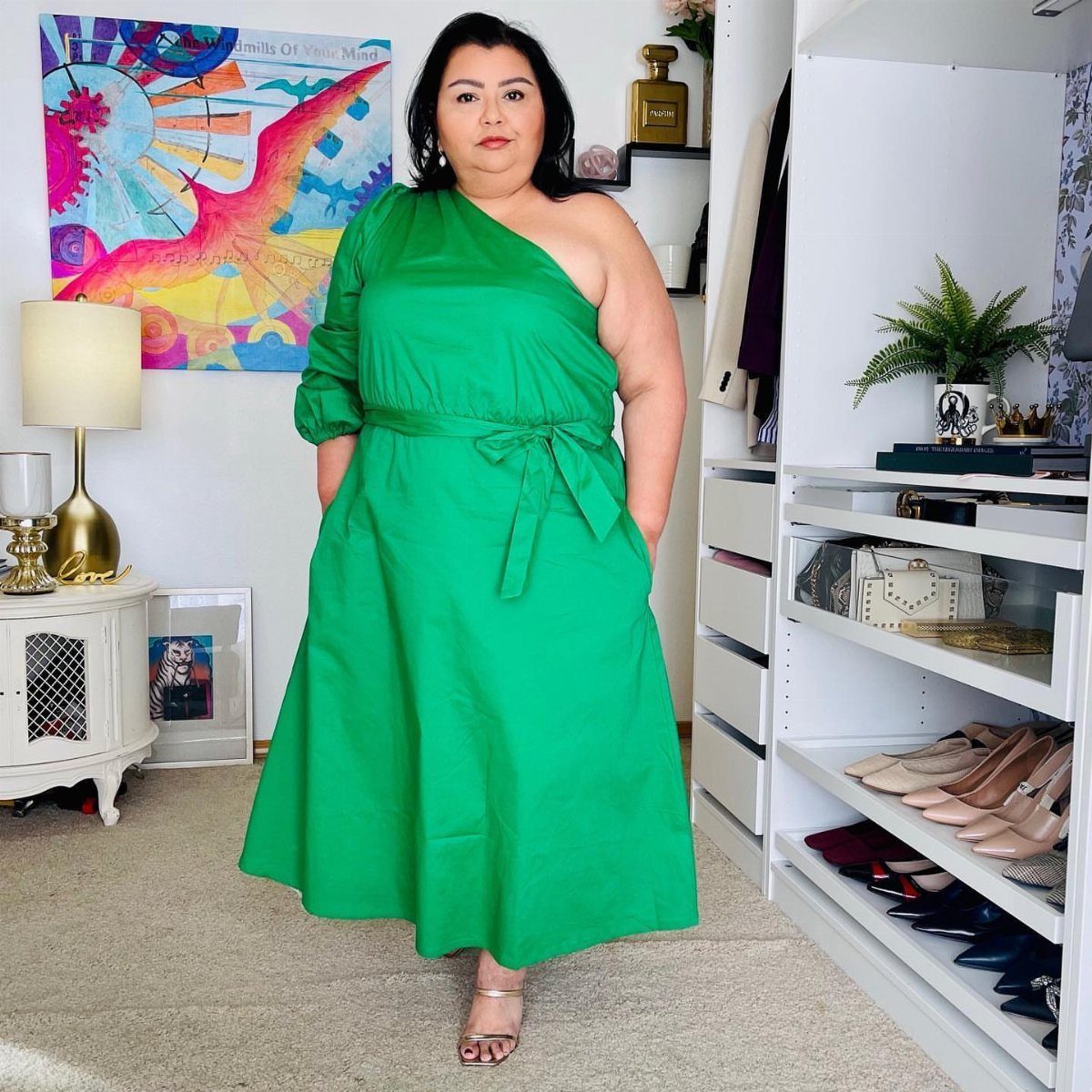 Walmart Spring Outfits: 10 Fresh Ideas for Women This Season 9 Woman in a bright green one-shoulder midi dress with a tie-waist in a bedroom.