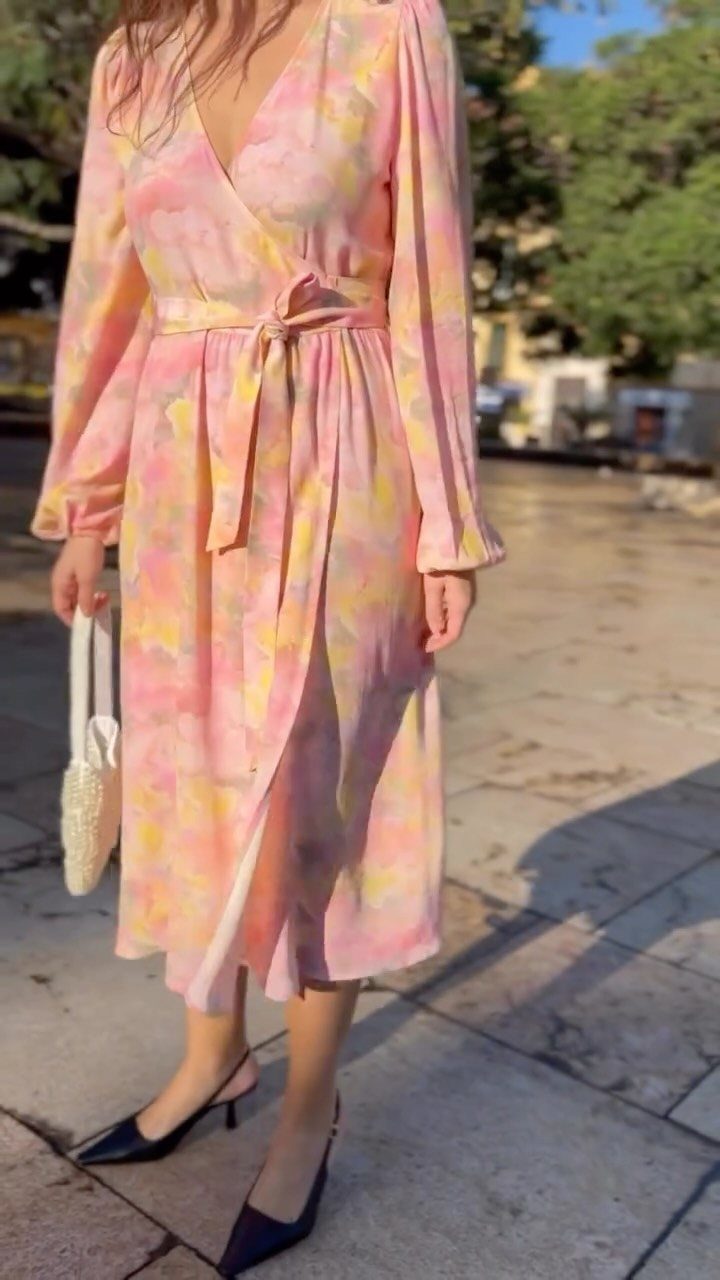 Walmart Spring Outfits: 10 Fresh Ideas for Women This Season 3 Person wearing a pink and yellow floral wrap dress with black heels.