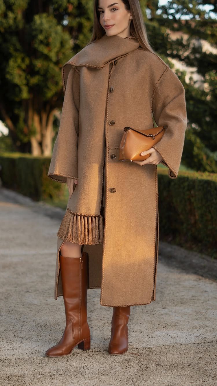 Women's Scarf Coat: 12 Ideas to Try This Season 8 Woman wearing a tan wool scarf coat with brown leather boots outdoors.