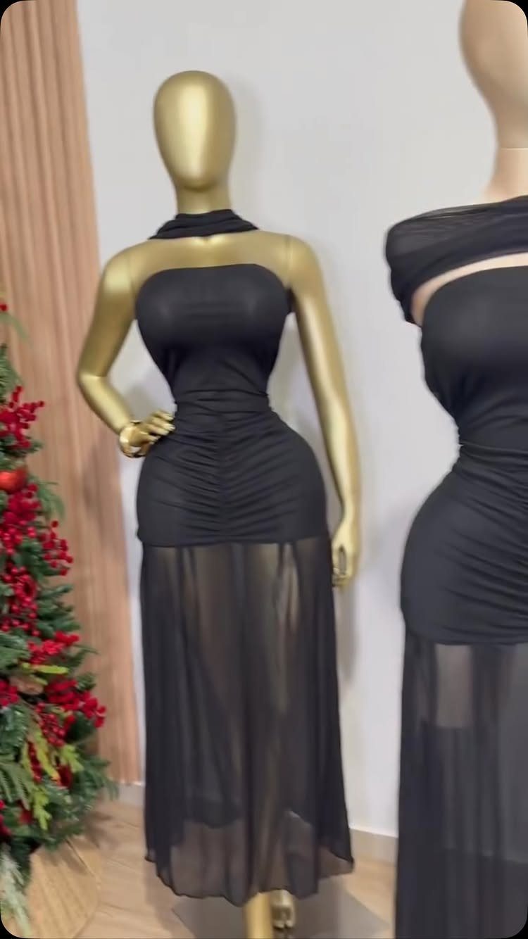 13 Zara Holiday Outfits for Parties and Celebrations 2 Black ruched dress with a sheer mesh skirt on a gold mannequin.