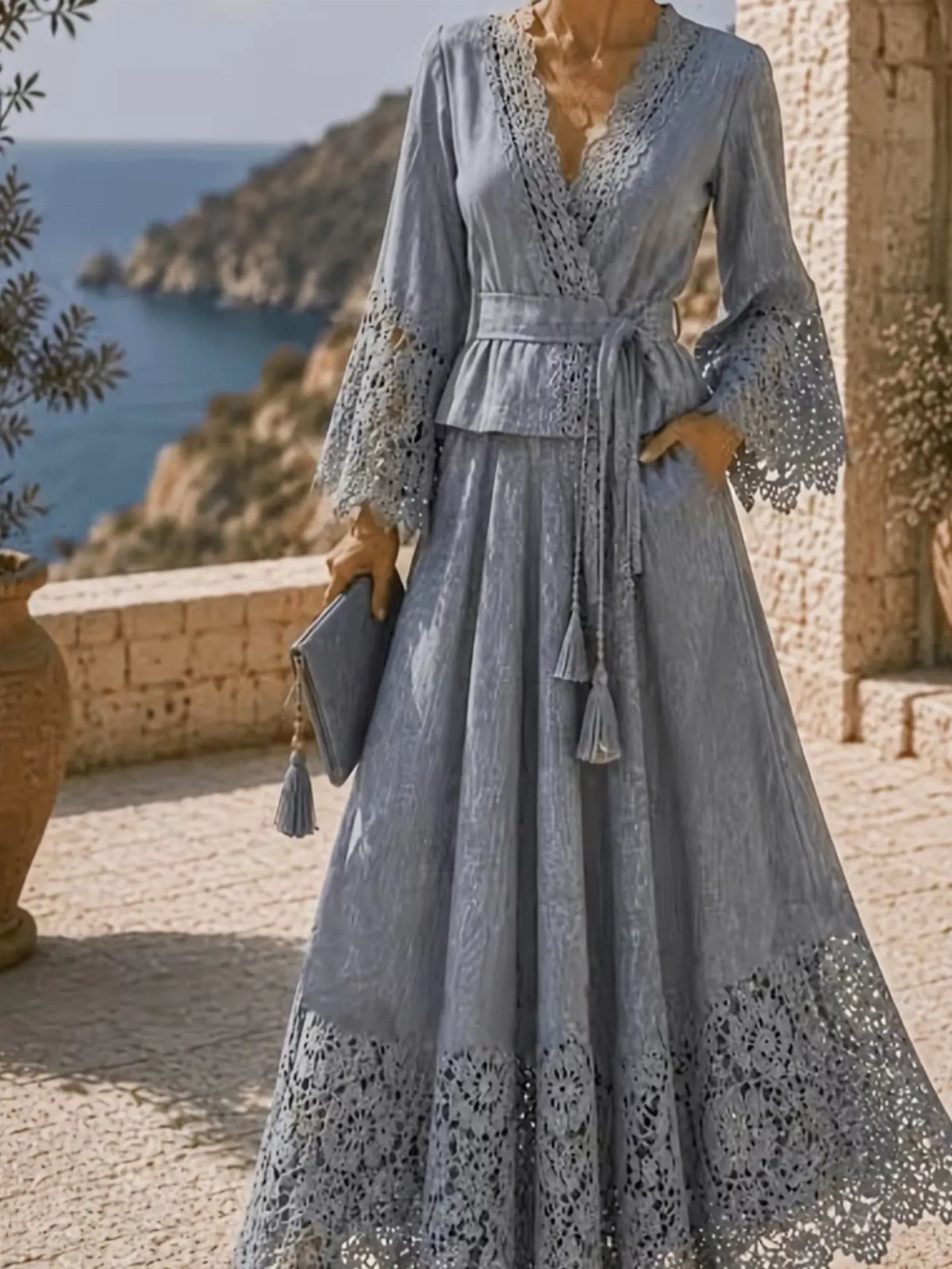 13 Zara Holiday Outfits for Parties and Celebrations 5 Light blue long sleeve dress with lace embroidery and tied waist by the sea